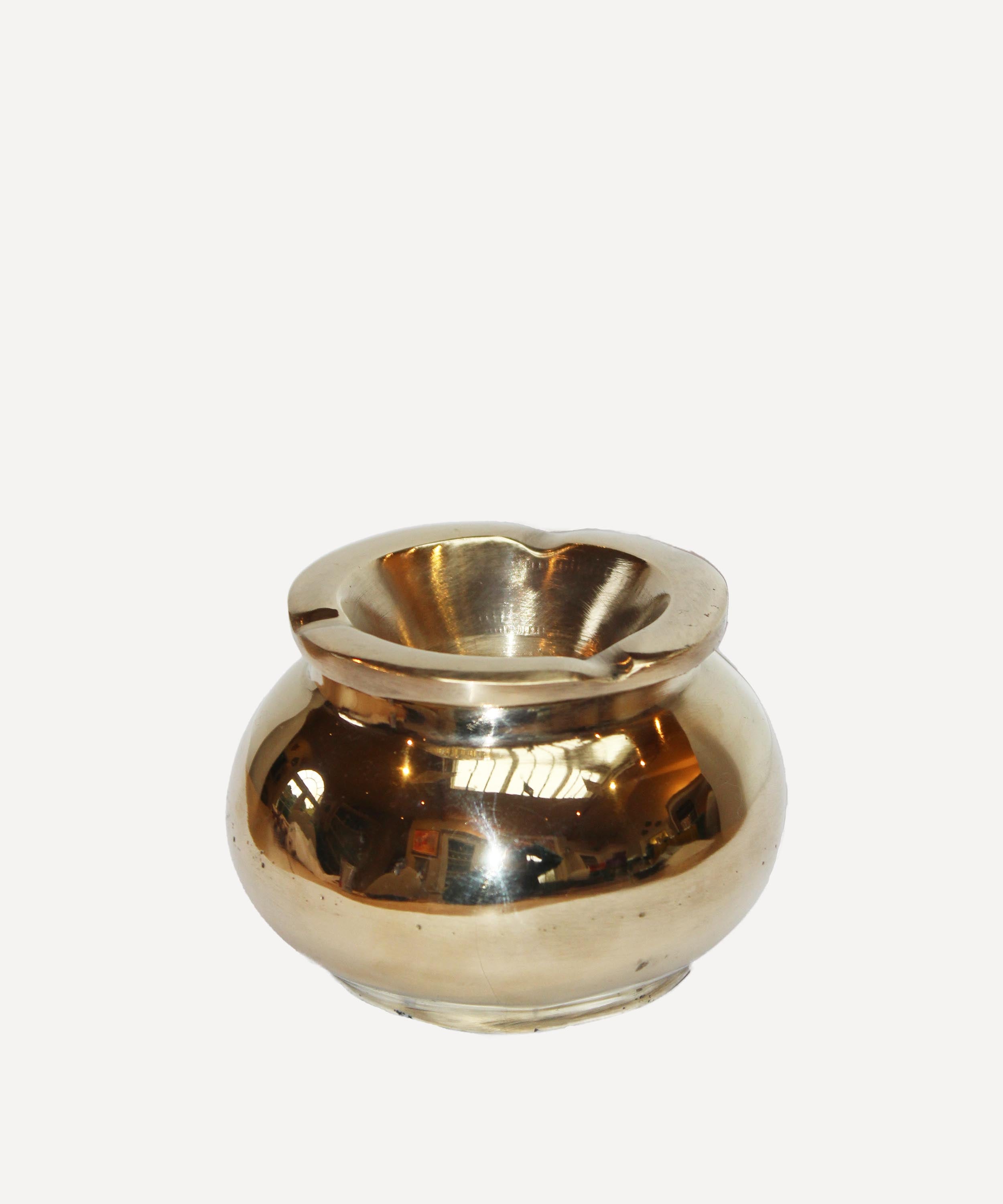The brass ashtray