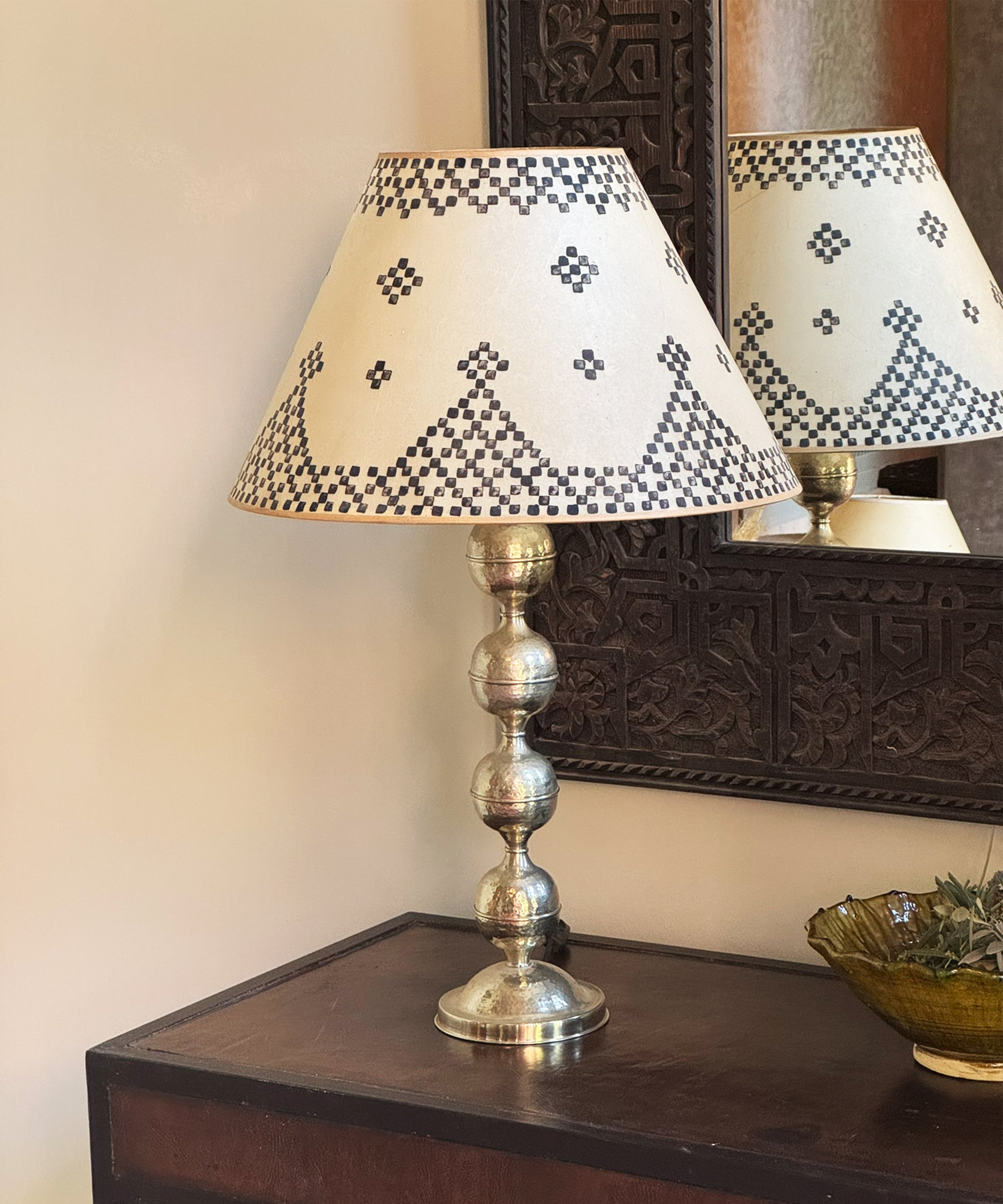 The chrome lamp base