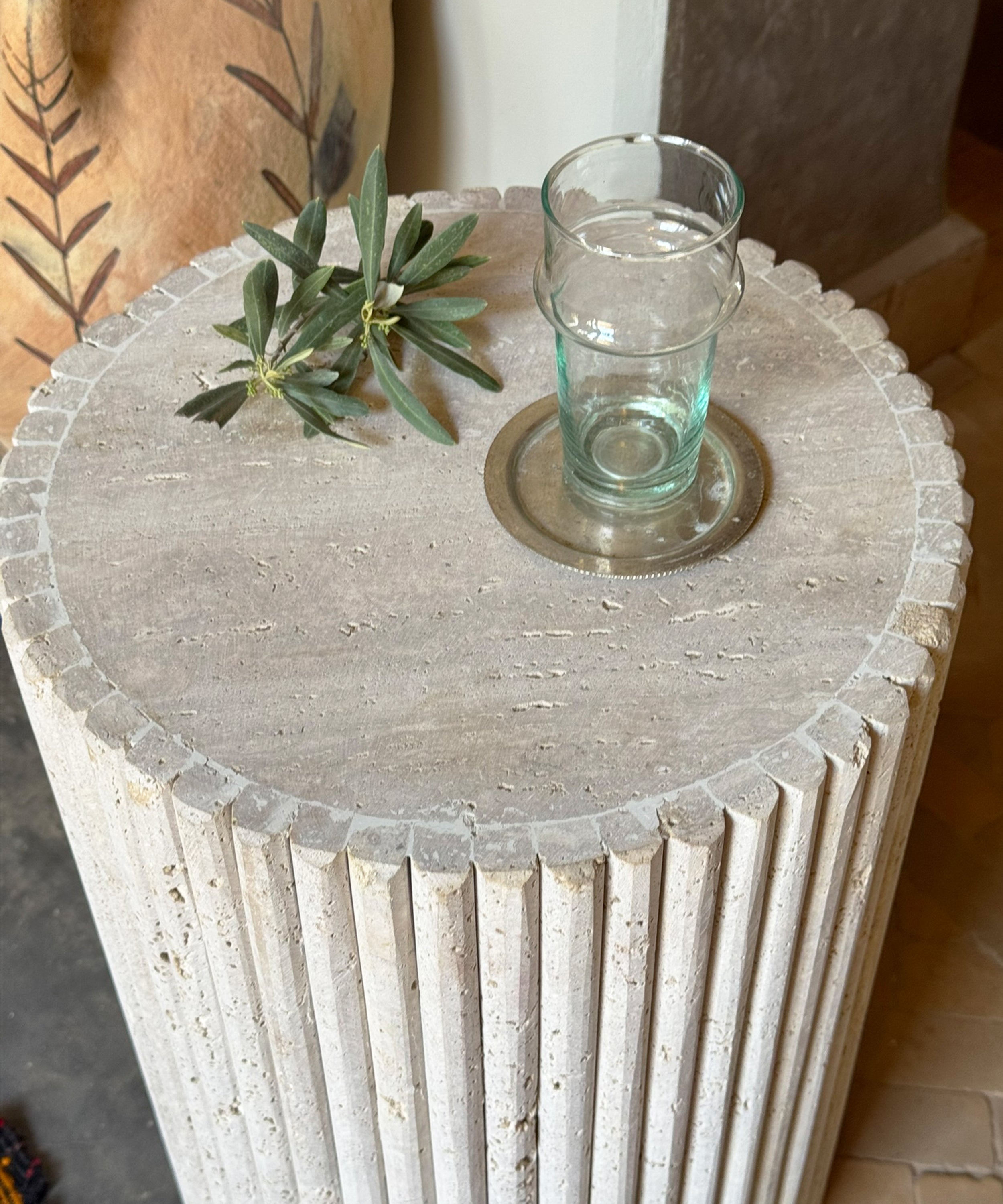 The fluted travertine side table