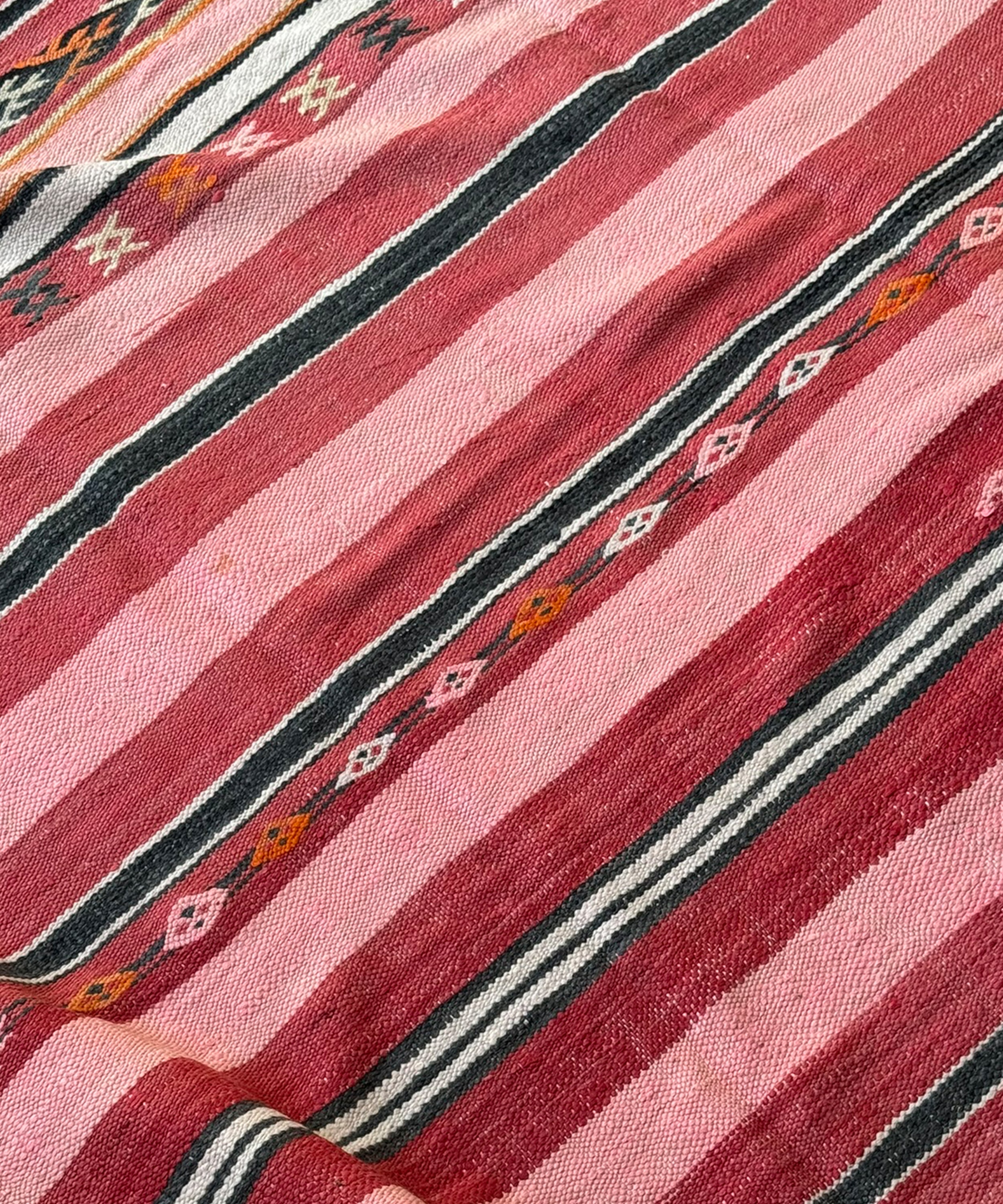 The vintage berber rug, pink stripes