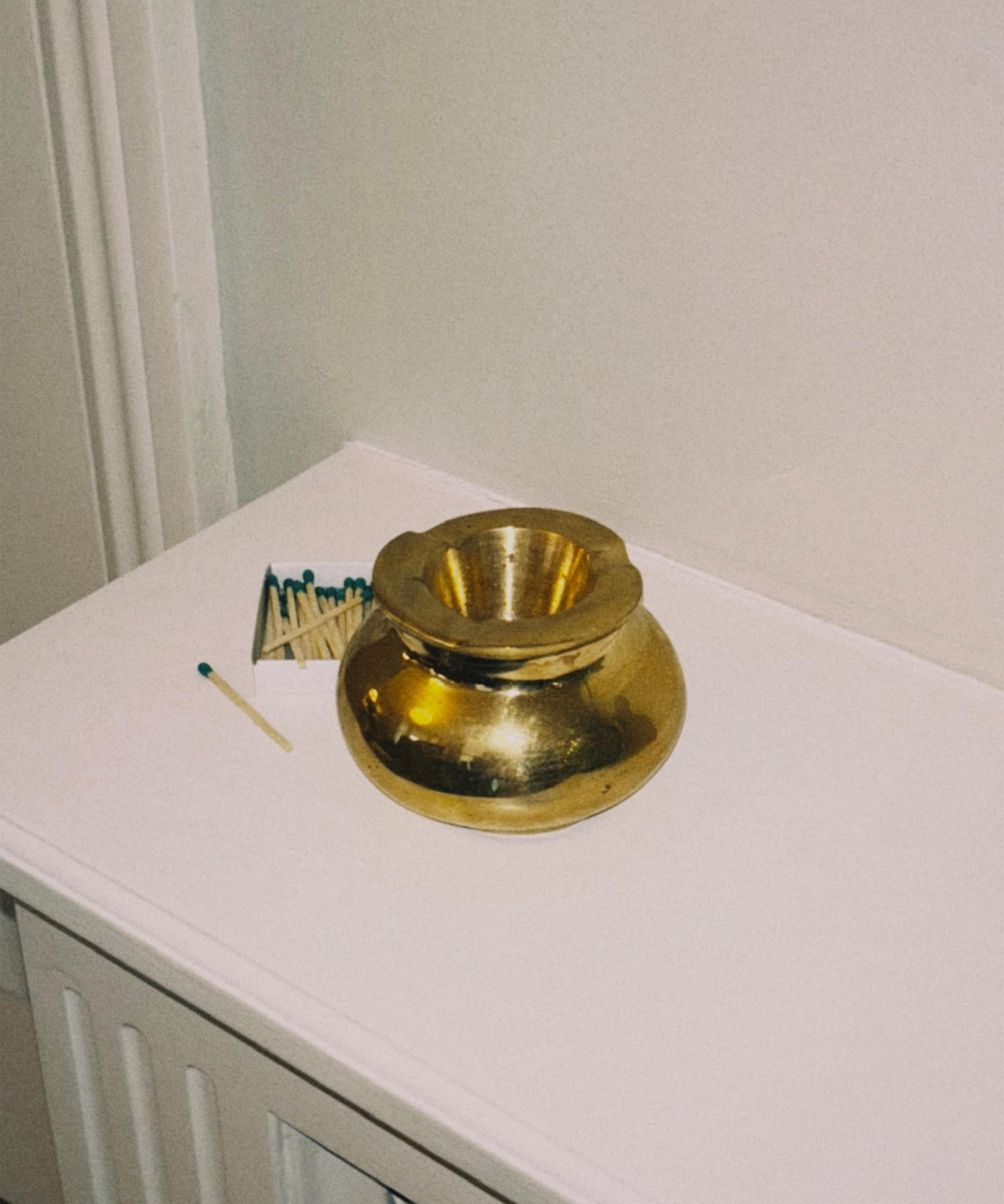 The brass ashtray